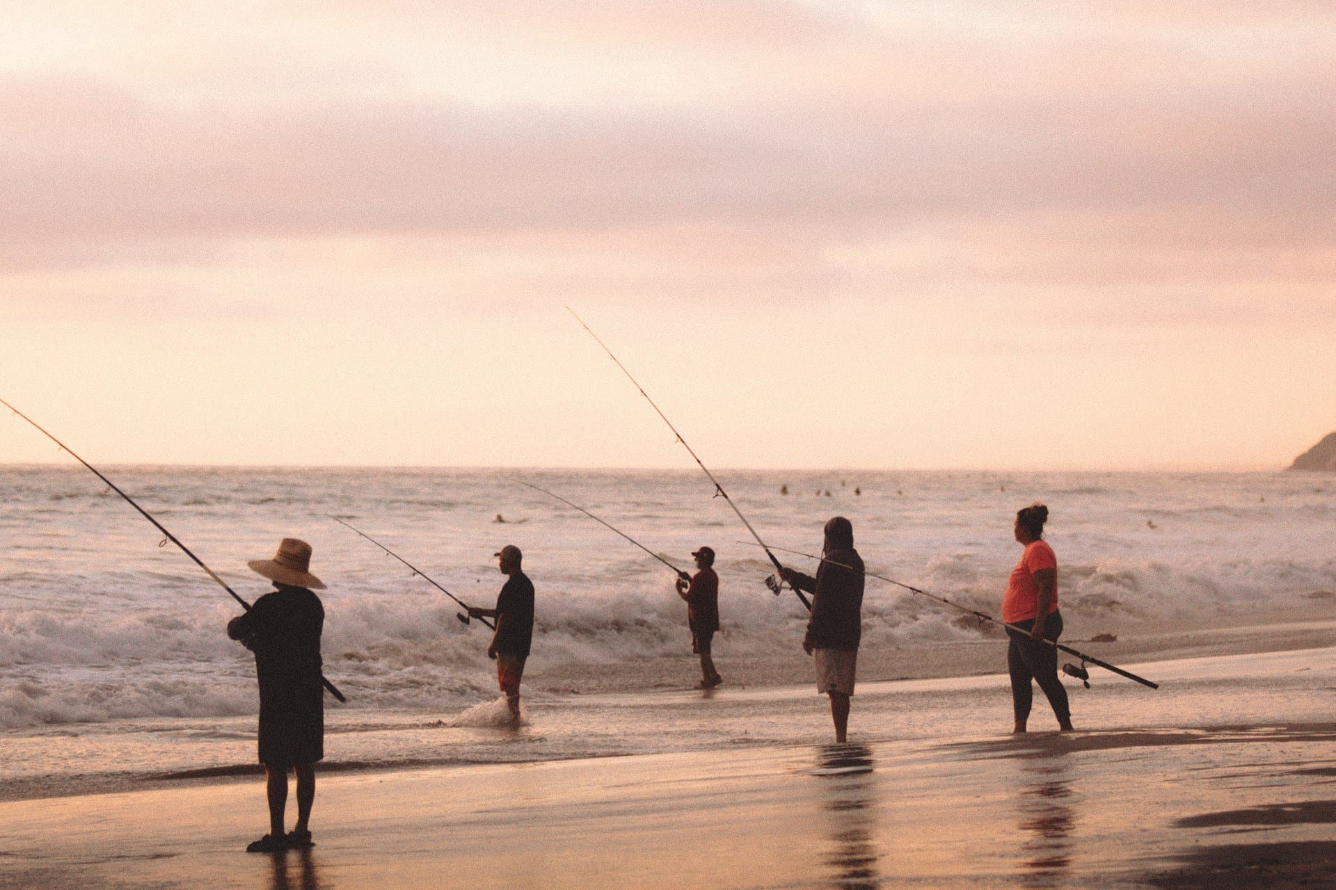 Anglers at golden hour at Fletcher Cove in Solana Beach
