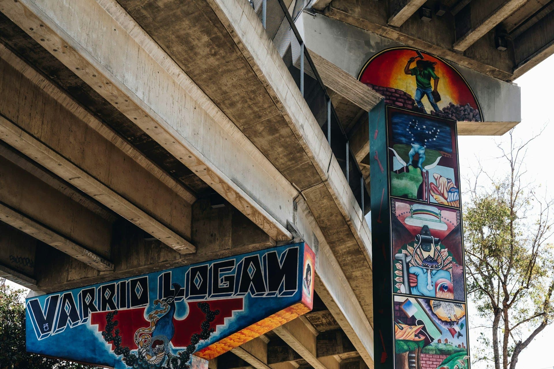 Mural-covered bridge pylons at Chicano Park in Barrio Logan