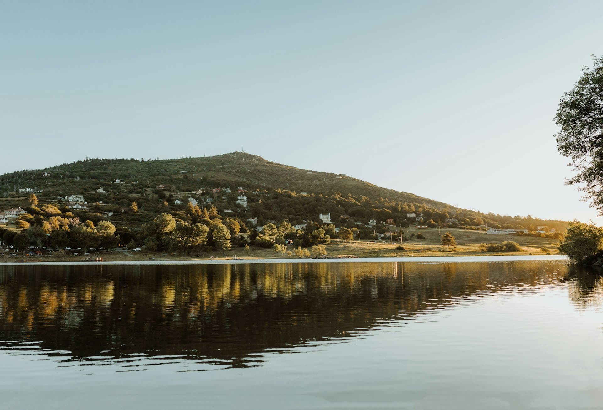 Golden hour on an oak-ringed lake in the North County backcountry
