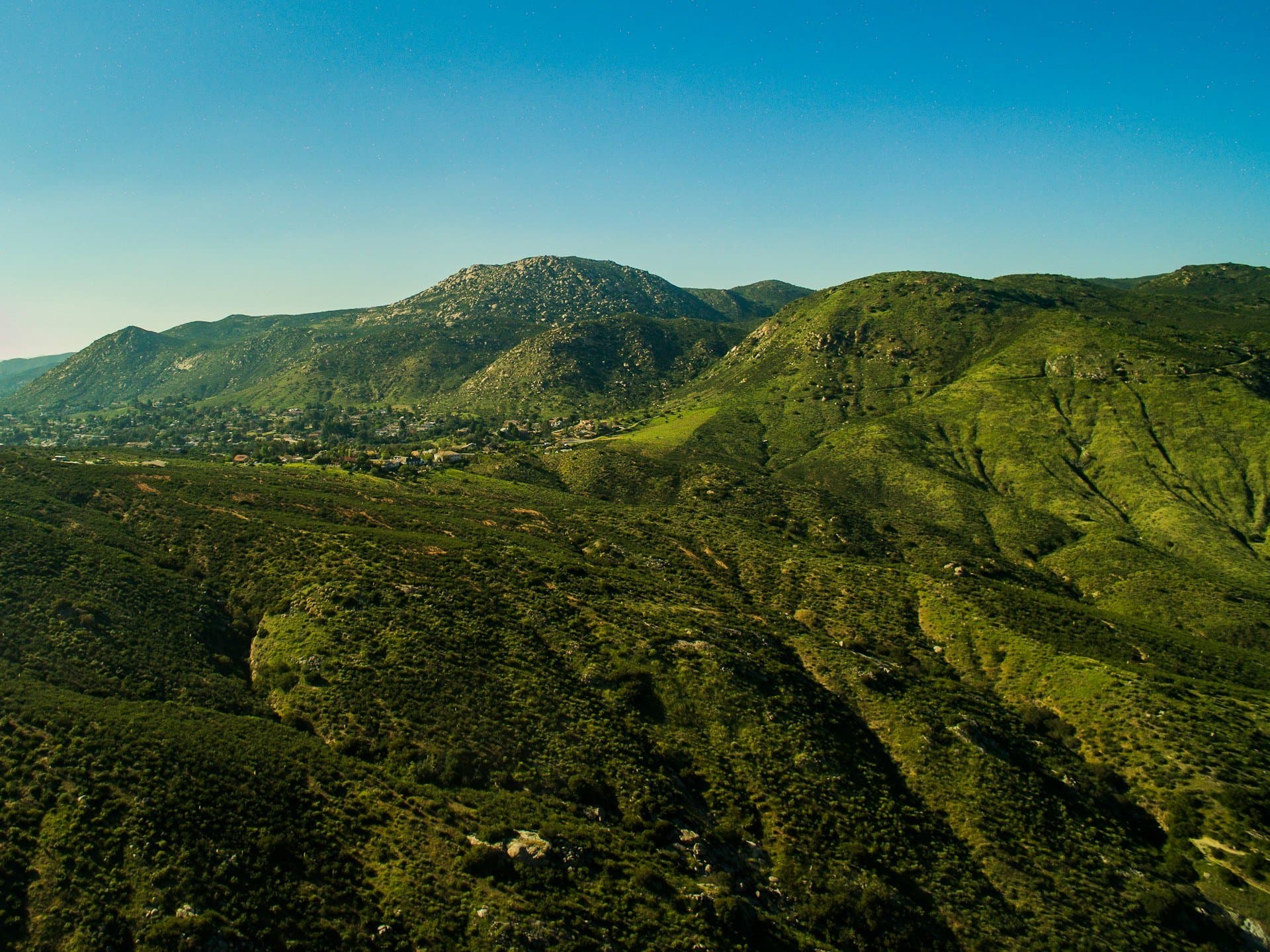 Spring-green hills in the San Diego River backcountry
