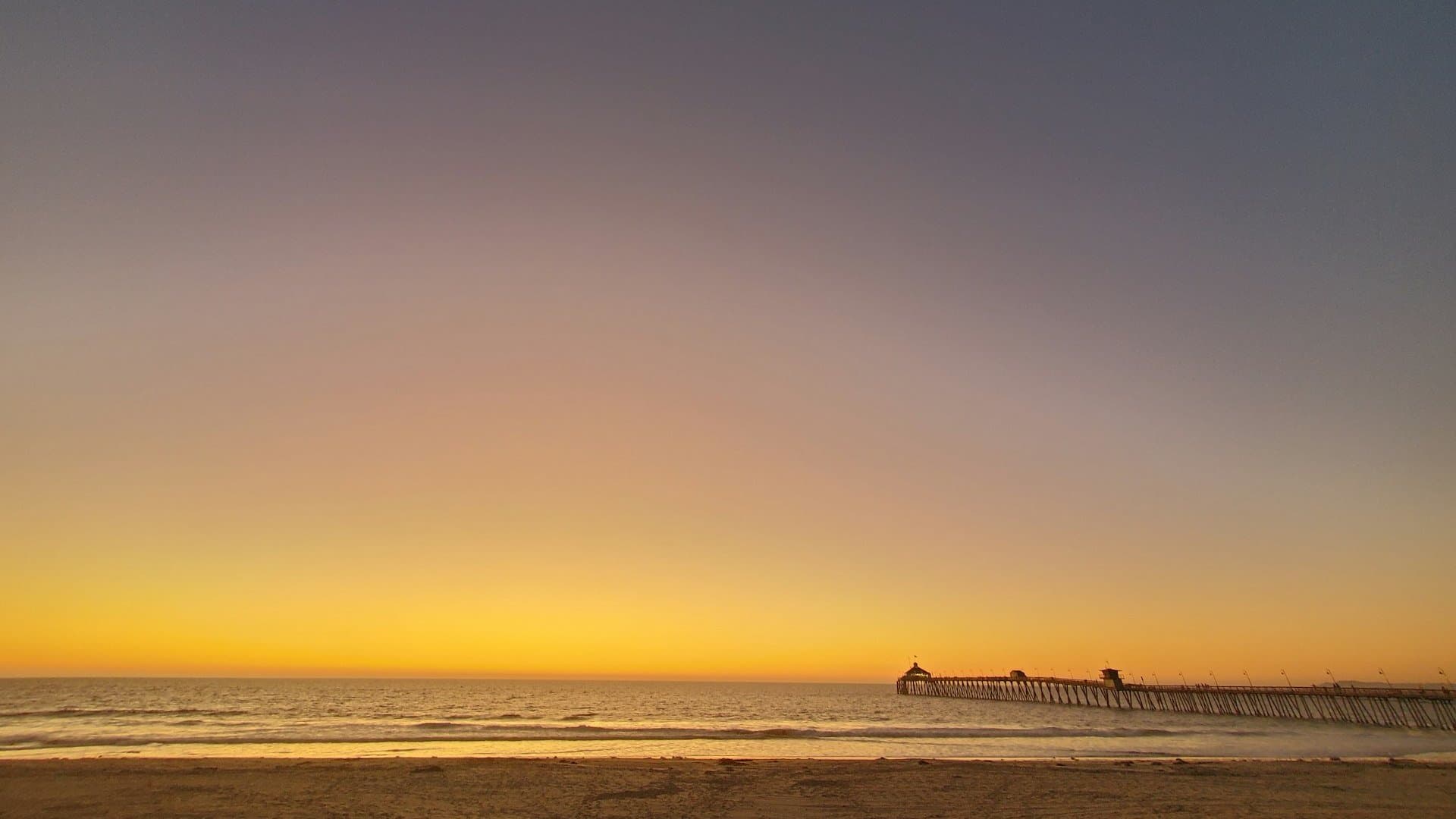 Imperial Beach Pier silhouetted at sunset