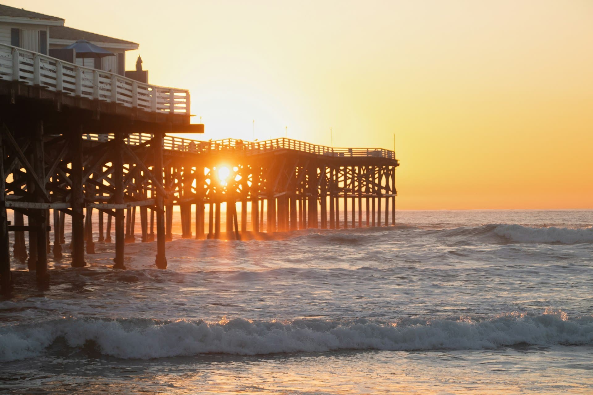 Sunset glowing through Crystal Pier in Pacific Beach