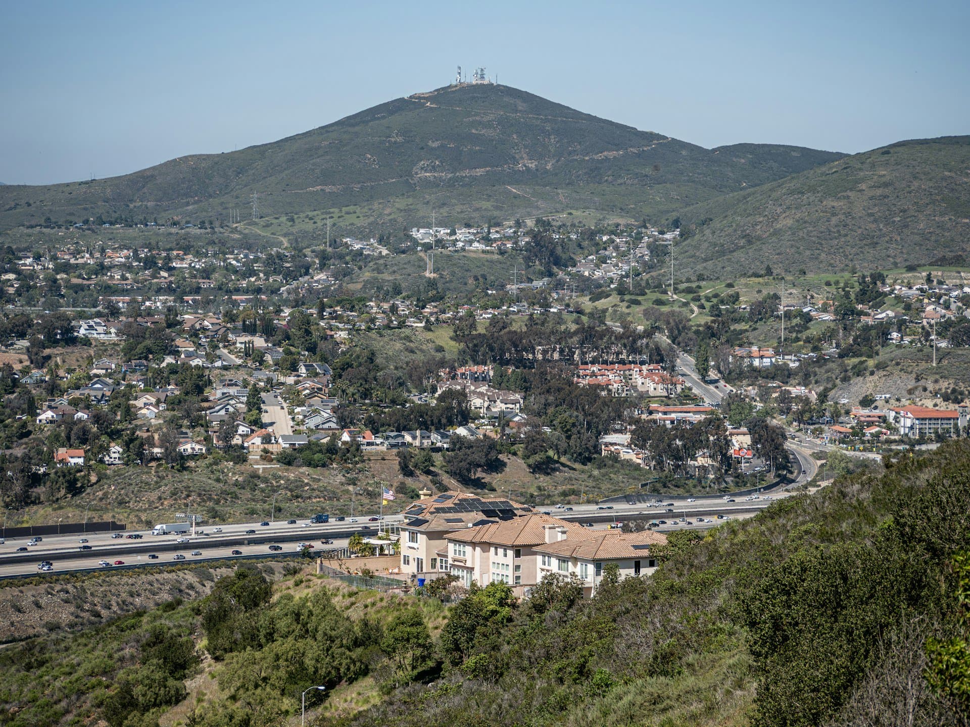 Hillside homes of Scripps Ranch beneath the peaks along Interstate 15